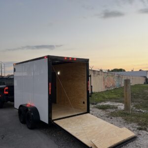 π 2026 6x12 Ta Enclosed Cargo Trailer Double Axle Polycore 0.080π₯ (WHITE / BLACK TRIM)