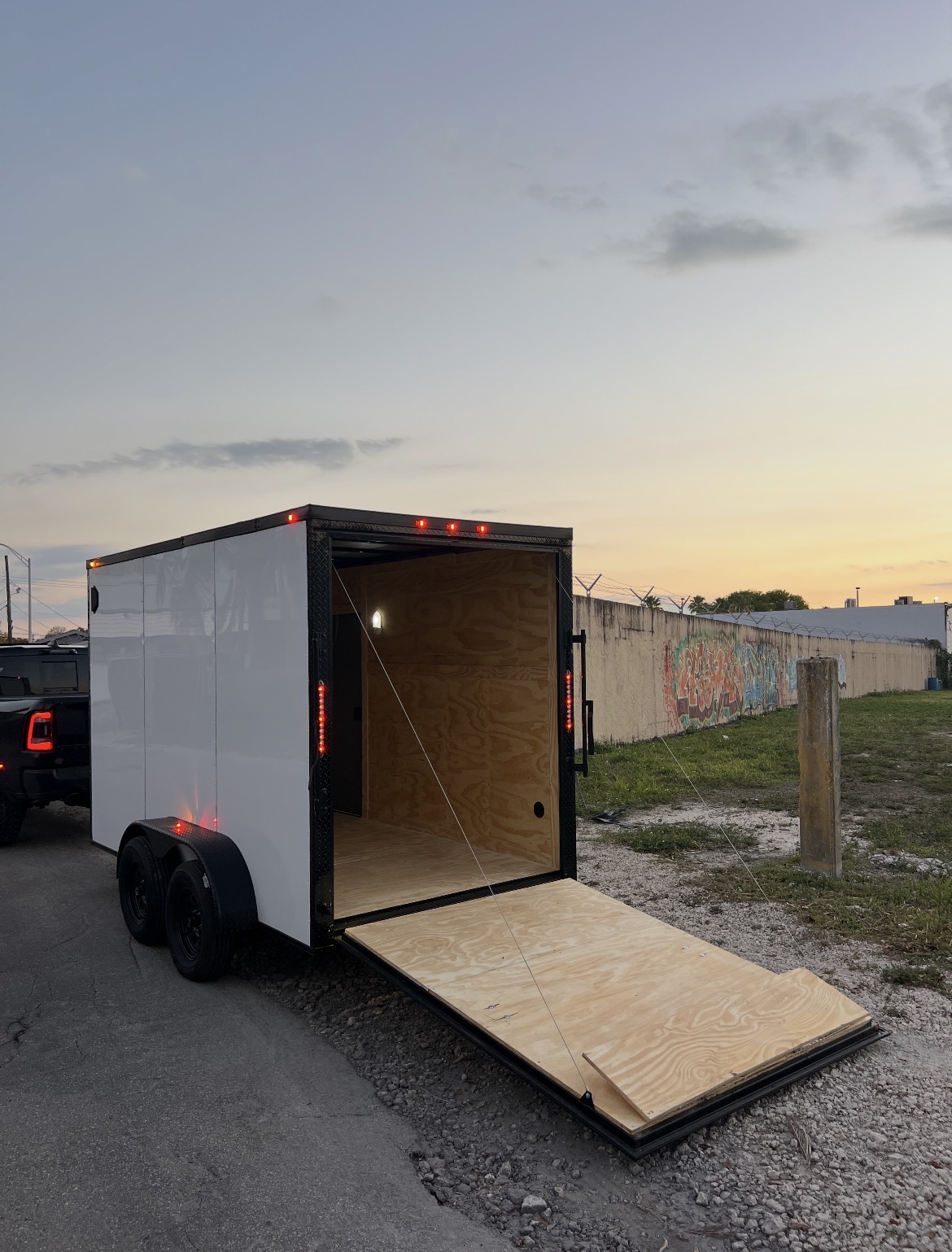 π 2026 6x12 Ta Enclosed Cargo Trailer Double Axle Polycore 0.080π₯ (WHITE / BLACK TRIM)