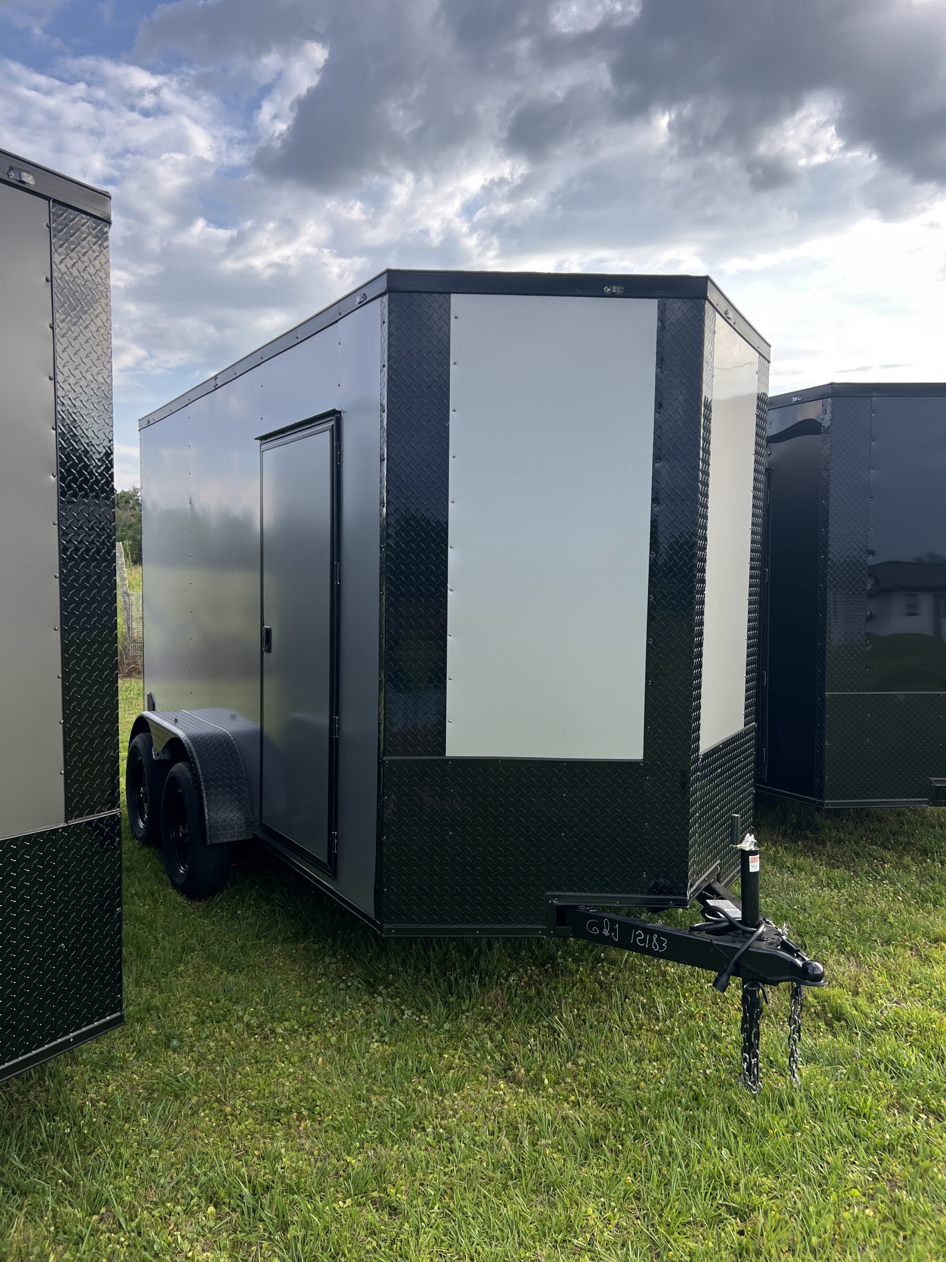 π 2026 6x12 Ta Enclosed Cargo Trailer Double Axle Polycore 0.080π₯ (SILVER / BLACK TRIM)